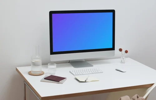 iMac mockup workspace setup with desk and chair