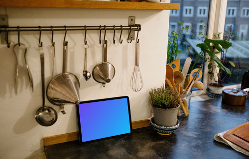 iPad Air mockup placed under a utensil rack