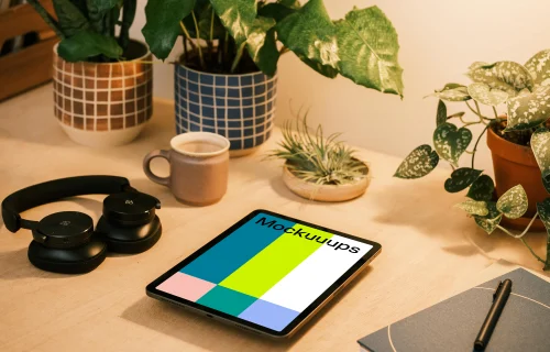 iPad Air mockup with a pair of headphones