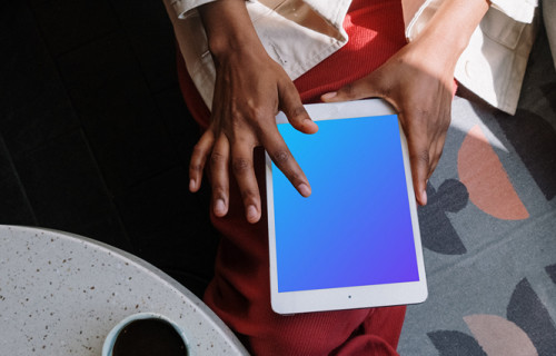 iPad Mini mockup in a ladies hand