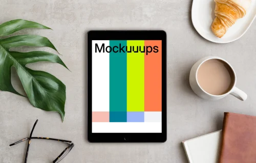 iPad Pro mockup next to the coffee and croissant