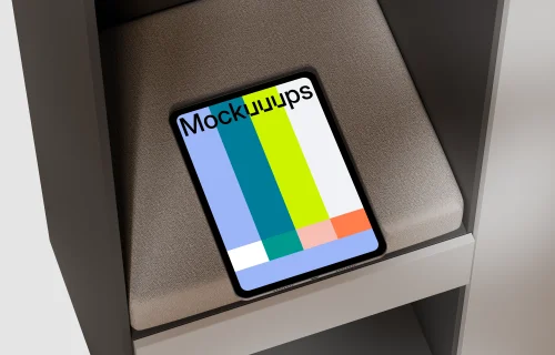 iPad Pro mockup on a textured cushion in a modern shelf