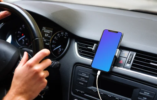 iPhone 11 mockup mounted next to car driver for navigation
