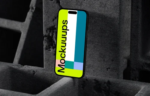 iPhone 16 mockup with concrete backdrop