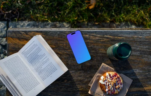 iPhone mockup on the outdoor bench