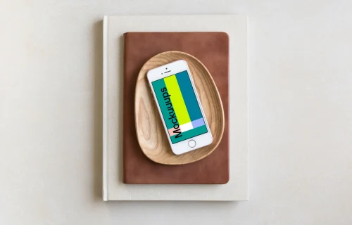 iPhone SE mockup placed on wooden plate