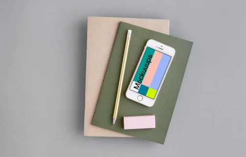 iPhone SE mockup with a green and brown journal