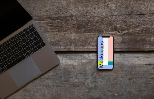 iPhone XS mockup and cropped Macbook Air on the wooden table