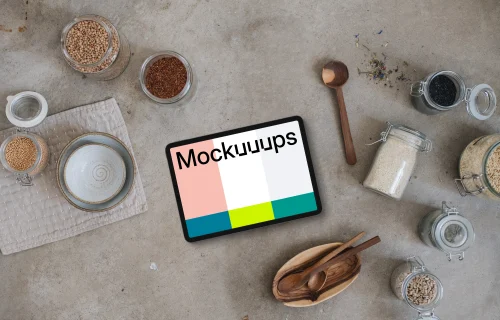 Landscape tablet mockup next to the jars