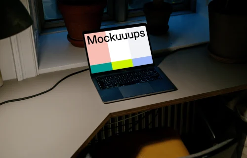 Laptop mockup on a white table