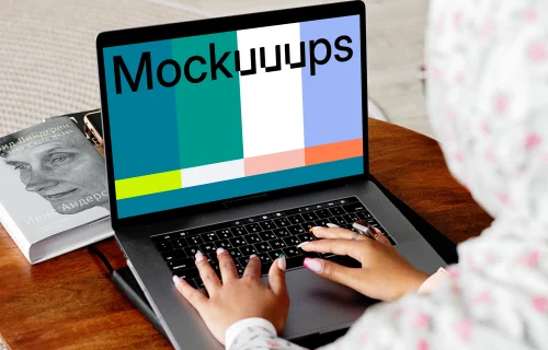 MacBook Air mockup in use by a lady with a head covering