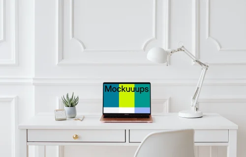 MacBook Air mockup on a white background with a reading lamp at the side