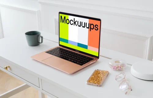 MacBook Air mockup with an iPhone at the side