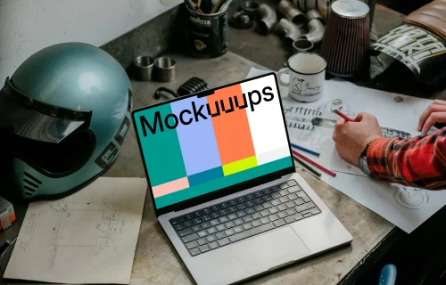 MacBook Pro mockup beside machine drawing