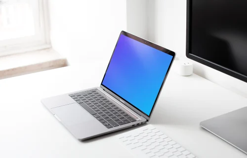 Macbook Pro mockup in the bright office