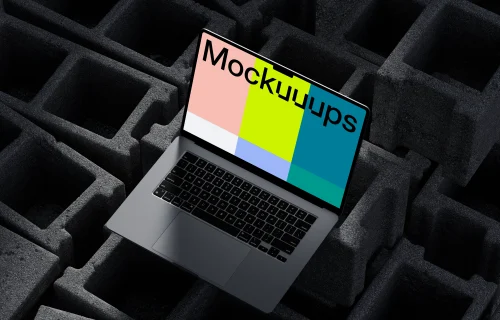 mockup do MacBook Pro em blocos de concreto texturizados