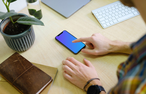 Man tapping on the iPhone 11 mockup screen