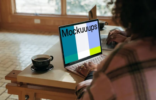 Microsoft Surface laptop mockup being used by a lady