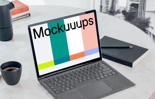 Microsoft Surface Laptop mockup on the white table