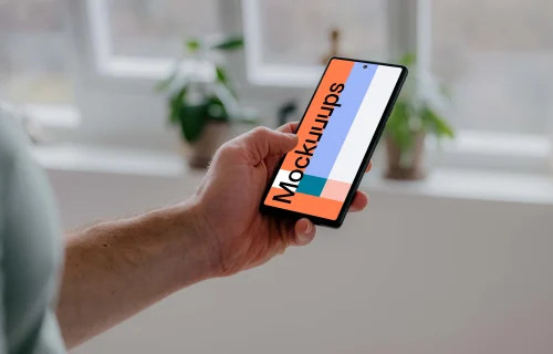 Person holding a Pixel 6 mockup