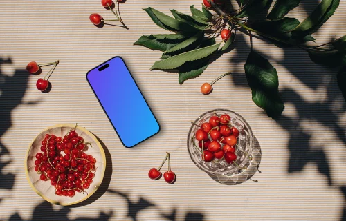 Phone mockup with a fresh fruit on the table