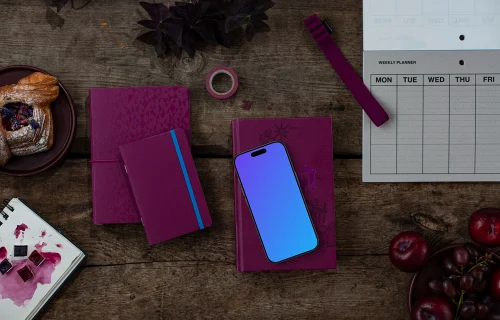 Phone on top of the book in Viva Magenta color