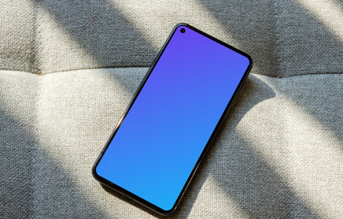Pixel 5 mockup on a grey sofa