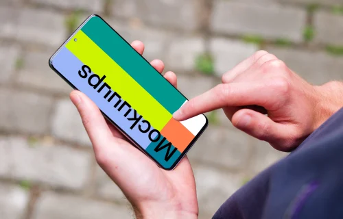 Pointing on Samsung Galaxy S20 mockup in the garden