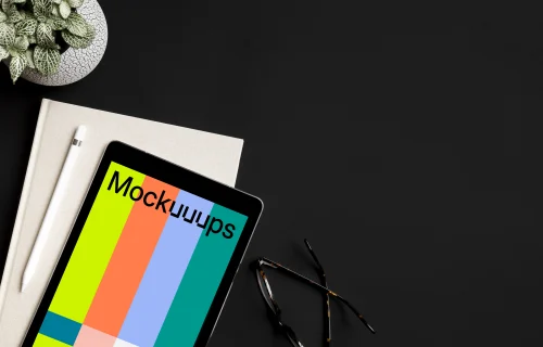 Rotated iPad Pro mockup on dark table