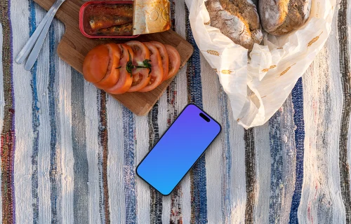 Seaside picnic with a smartphone mockup