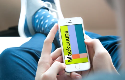 Sitting and playing games on iPhone SE mockup