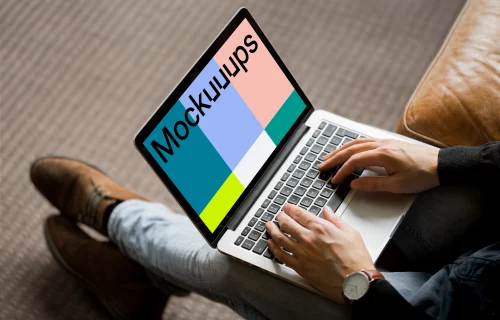 Sitting and typing on Macbook Pro mockup