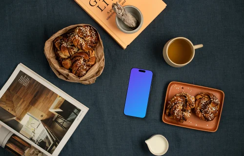 Smartphone mockup nearby pastries