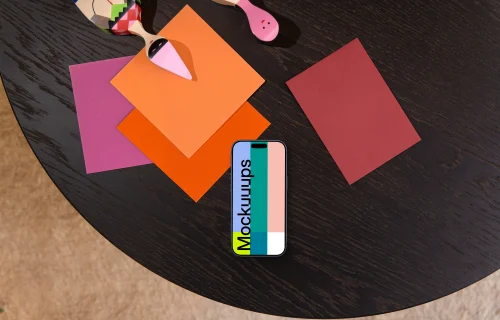 Smartphone mockup on a designer office table