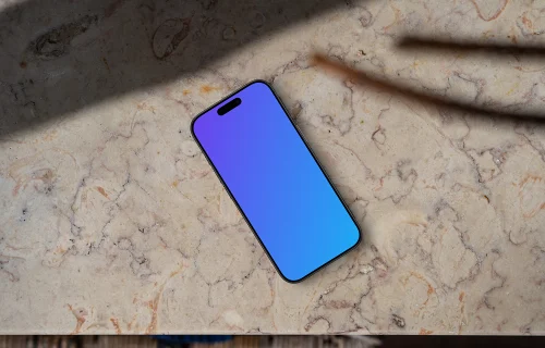 Smartphone mockup on a marble table