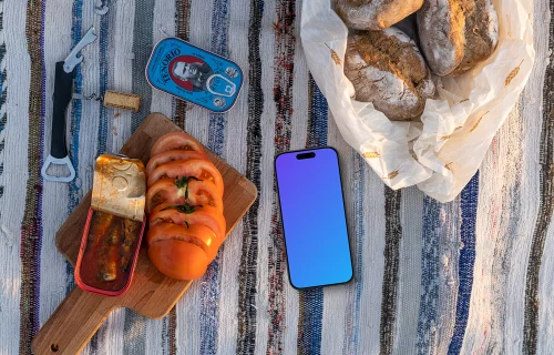 Smartphone mockup on a picnic blanket