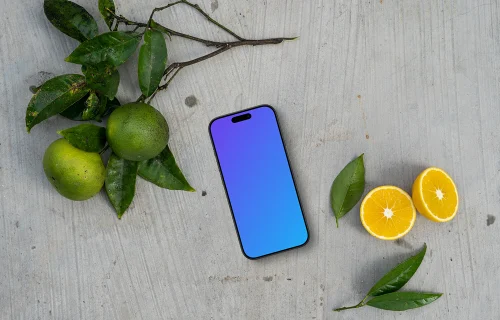 Smartphone mockup on a table with citrus fruits