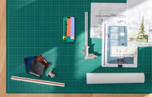 Smartphone mockup on architect's planning table