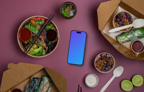 Smartphone mockup surrounded by Asian food