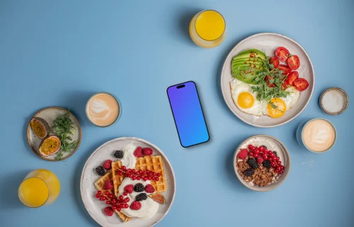 Smartphone mockup surrounded by breakfast