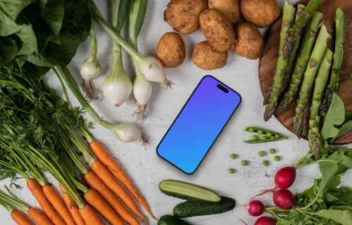 Smartphone mockup surrounded by vegetables