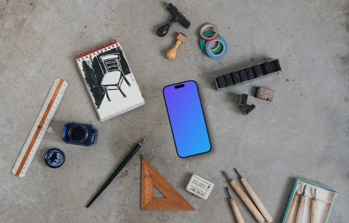 Smartphone mockup with a brush and ink on the side