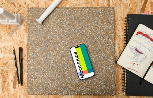 Smartphone mockup with architectural sketching supplies