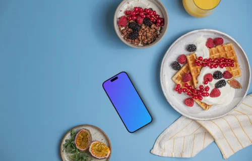 Smartphone mockup with breakfast plates
