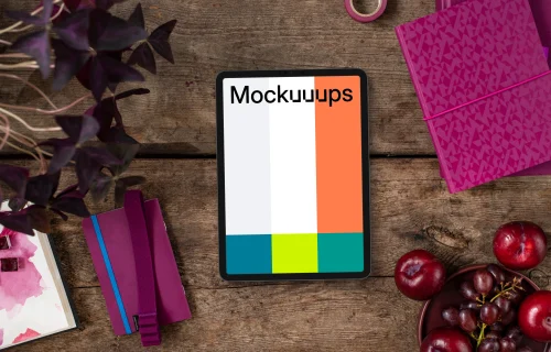 Tablet between Viva Magenta books