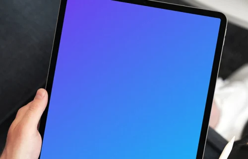 Tablet mockup held by user in a car
