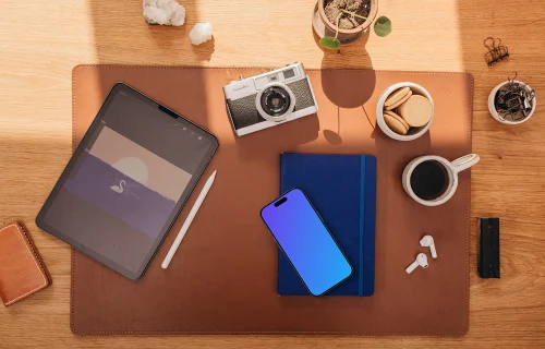 Top view of smartphone mockup on the office desk