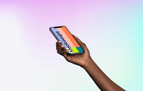 Woman holding iPhone XS mockup (Perspective - Gradient 3)
