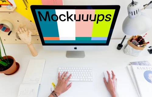 Woman working on iMac mockup