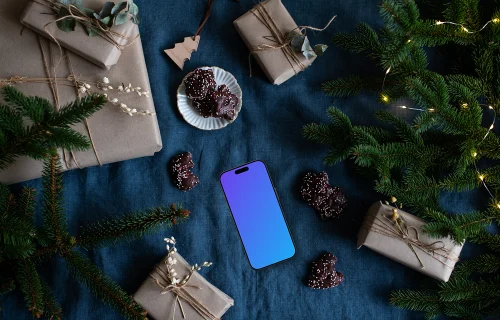 Xmas phone mockup with gifts on the side